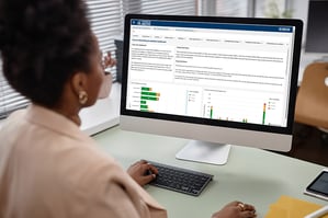 School administrator reviewing the Mindex Advanced Analytics Course Scheduling Dashboard.