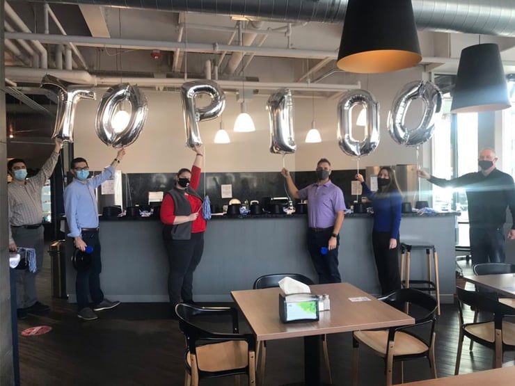 Employees Holding Balloons Top 100