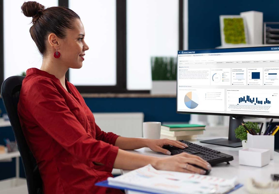School-Administrator-looking-at-Mindex-Advanced-Analytics-Dashboard