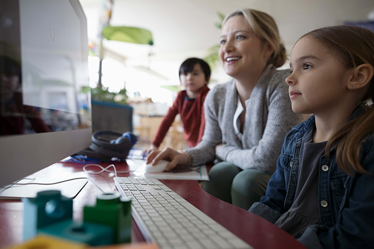 mother and children looking at schooltool